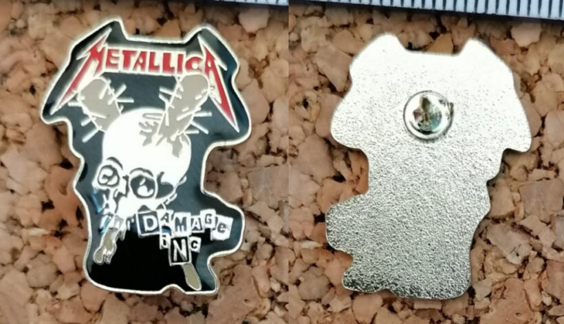 Second picture of X Second picture of Damage Inc. Enamel Pin