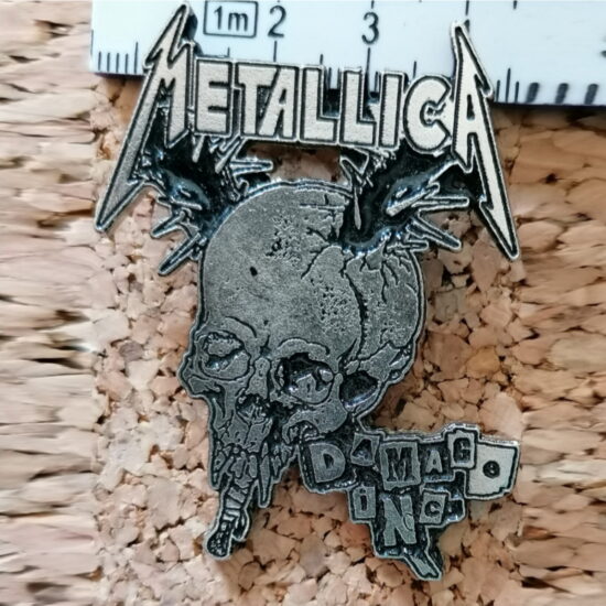 Damage Inc. Enamel Pin