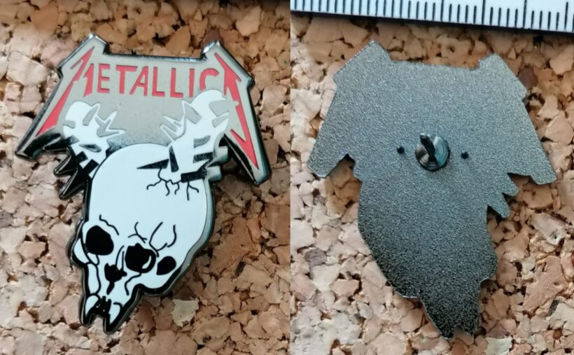Second picture of Damage Inc. Enamel Pin