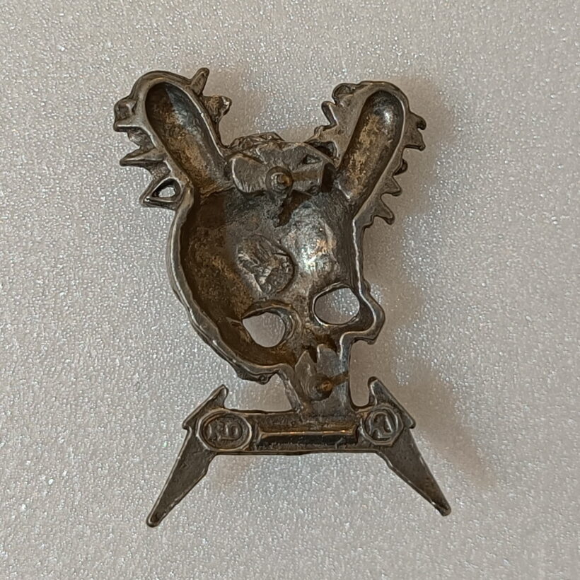 Back of Damage Inc. Pewter Pin Back of Damage Inc. Pewter Pin