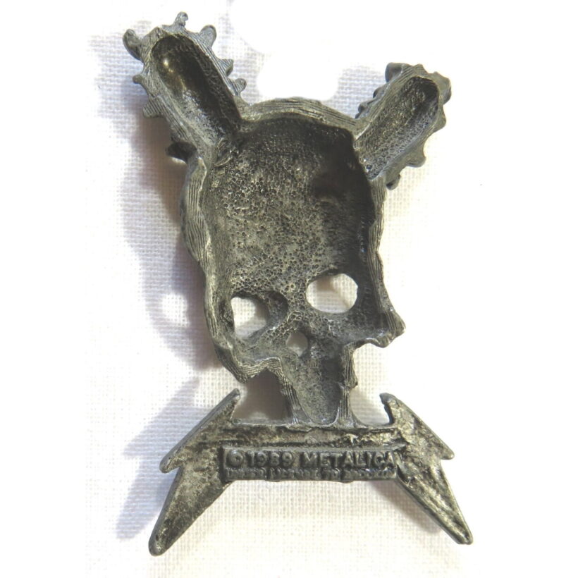 Back of Damage Inc. Pewter Pin