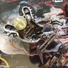 Second picture of the back of Damage Inc. Pewter Pin