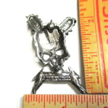 Back of Damage Inc. Pewter Pin