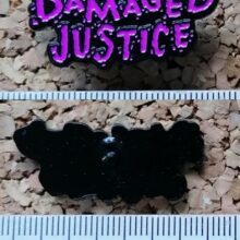 Second picture of Damaged Justice Lettering Enamel Pin