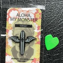 Packaging of Kirk Von Hammett - Krapotz Surf Bat Enamel Pin Packaging of Kirk Von Hammett - Krapotz Surf Bat Enamel Pin