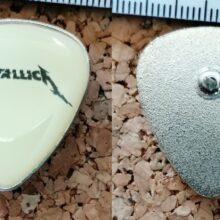 Second picture of X Second picture of Metallica Glitch Logo Guitar Pick Offset Printed Pin