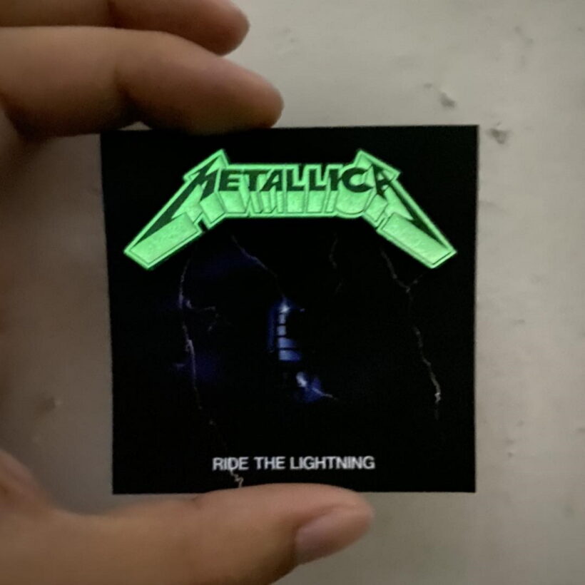 Glowing effect of Metallica Ride The Lightning Logo Enamel Pin