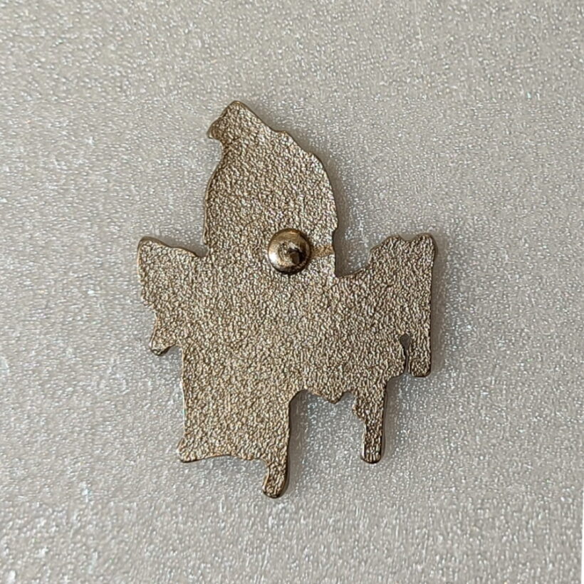 Back of Scary Guy Enamel Pin
