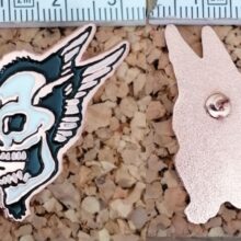 Second picture of Singing Skull Enamel Pin