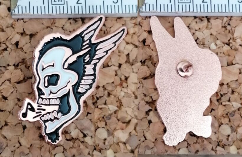 Second picture of Singing Skull Enamel Pin