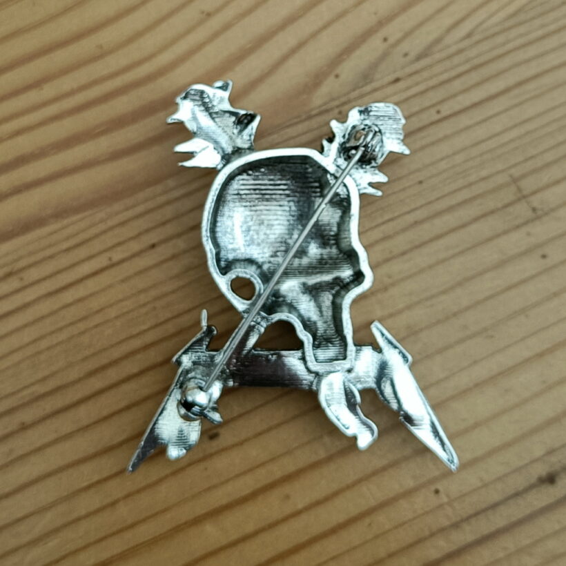 damage-inc-pewter-pin-12-back