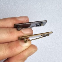 metallica-kill-em-all-logo-rectangular-enamel-pins-1-and-9-comparison-1-2