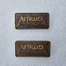 metallica-kill-em-all-logo-rectangular-enamel-pins-1-and-9-comparison-1