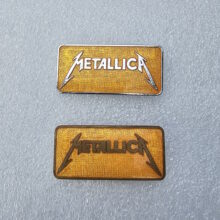 metallica-kill-em-all-logo-rectangular-enamel-pins-2-and-8-comparison-1