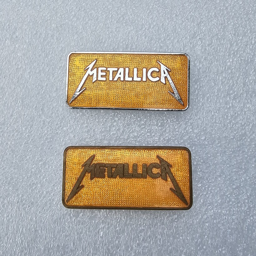 metallica-kill-em-all-logo-rectangular-enamel-pins-2-and-8-comparison-1