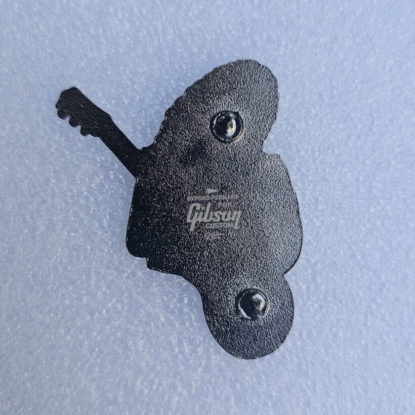 kirk-hammett-playing-his-blacked-out-les-paul-custom-guitar-enamel-pin-1-1-back