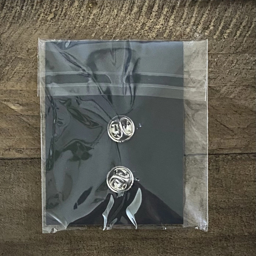 m72-world-tour-nashville-pop-up-store-pin-1-packaging-2-back